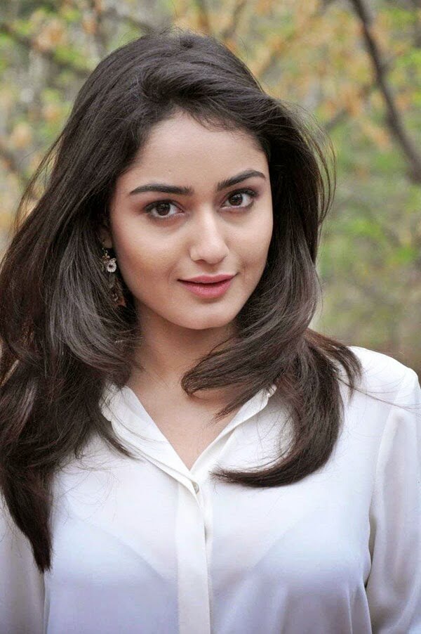 Actress Tridha Choudhury in white top and jeans pant stills 01